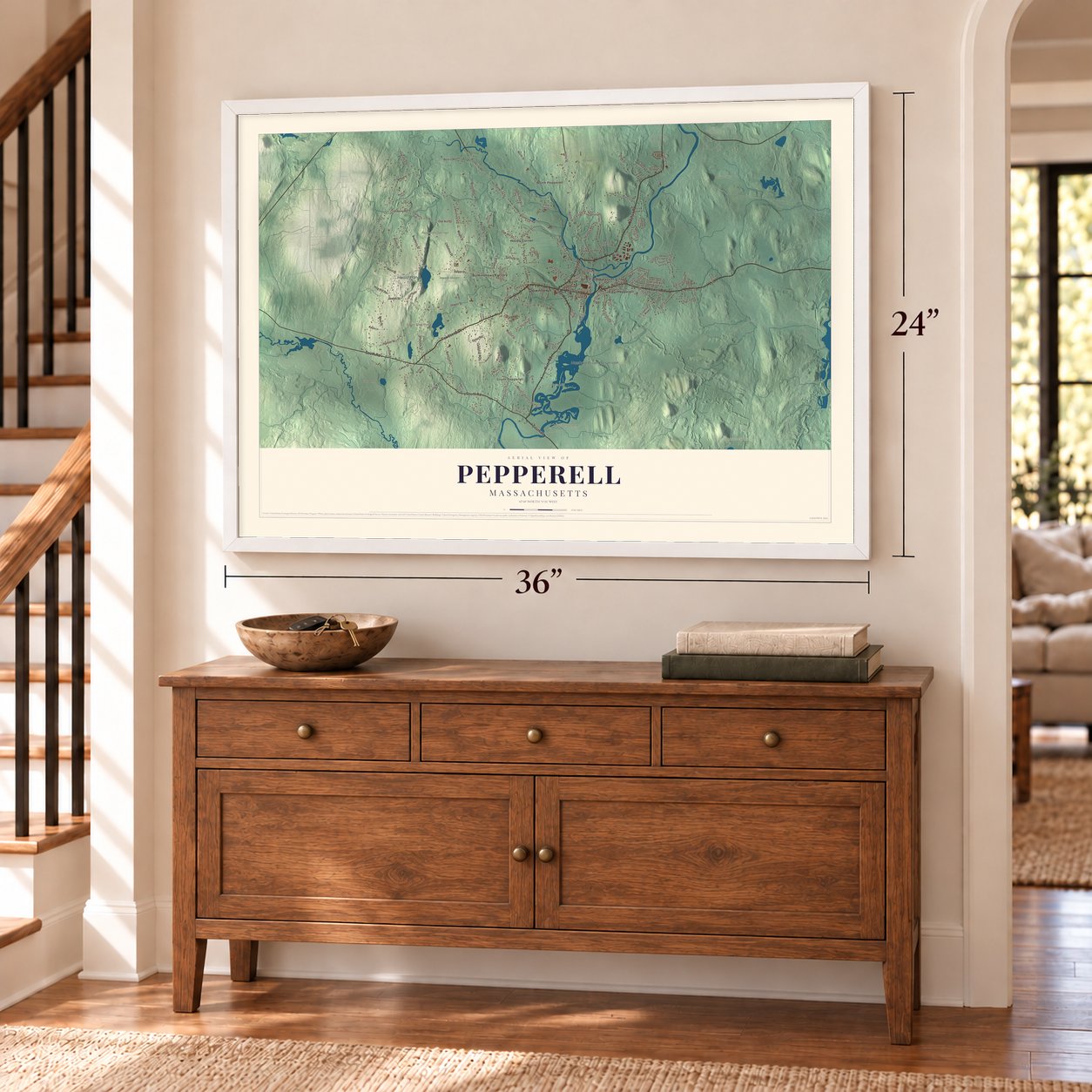 Pepperell, Massachusetts map, 24 x 36 inch print in a white frame above a dresser by a staircase