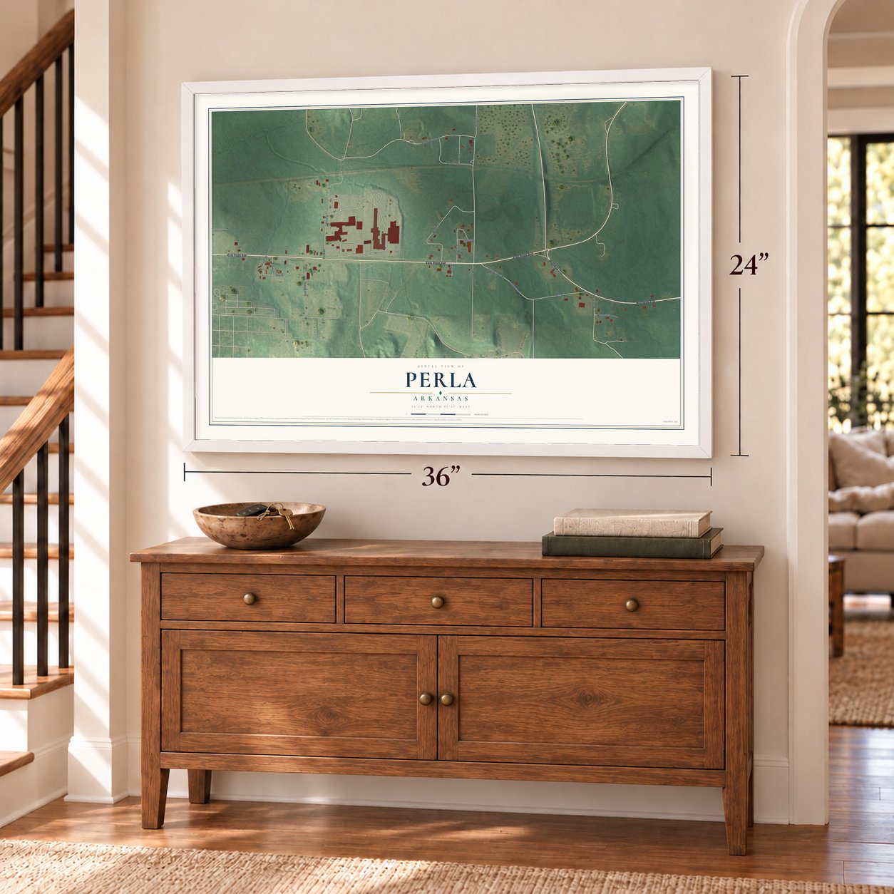 Perla, Arkansas map, 24 x 36 inch print in a white frame above a dresser by a staircase