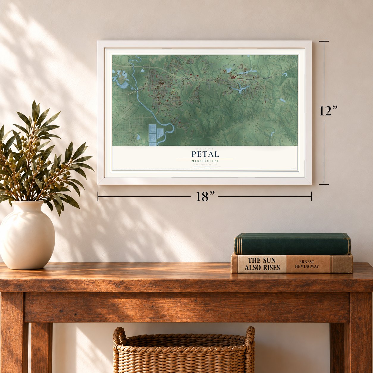 Petal, Mississippi map, 12 x 18 inch print in a white frame in an entryway