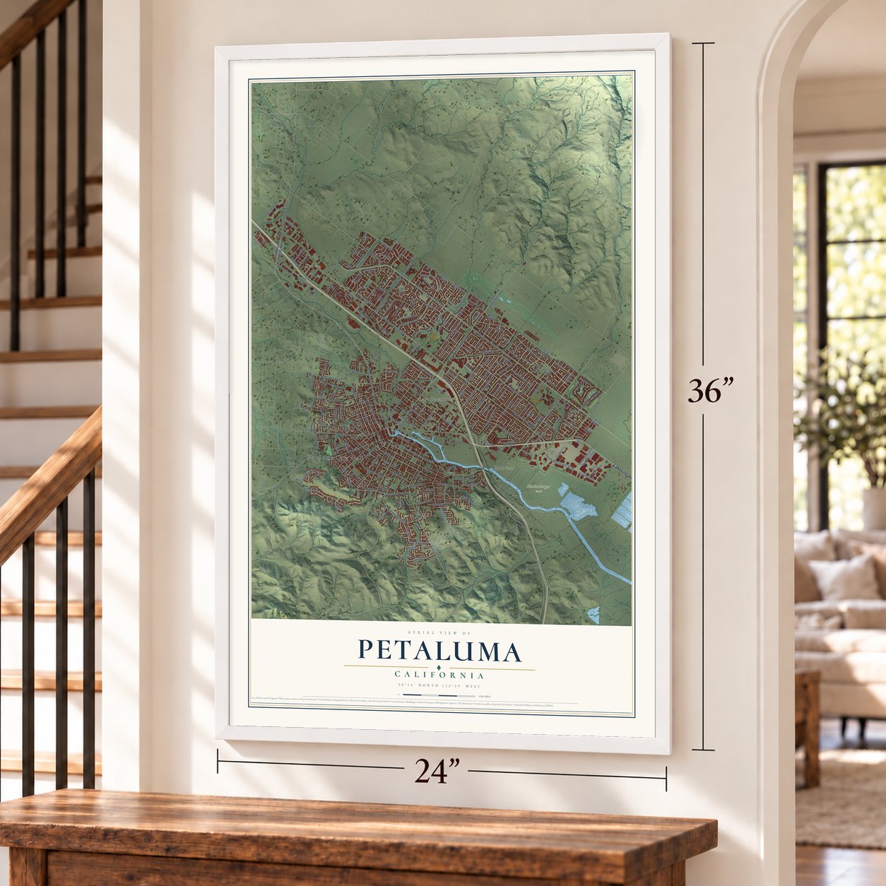 Petaluma, California map, 24 x 36 inch print in a white frame by a staircase