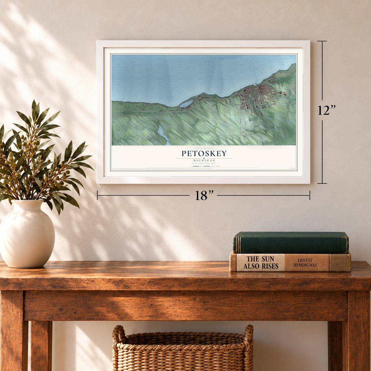 Petoskey, Michigan map, 12 x 18 inch print in a white frame in an entryway