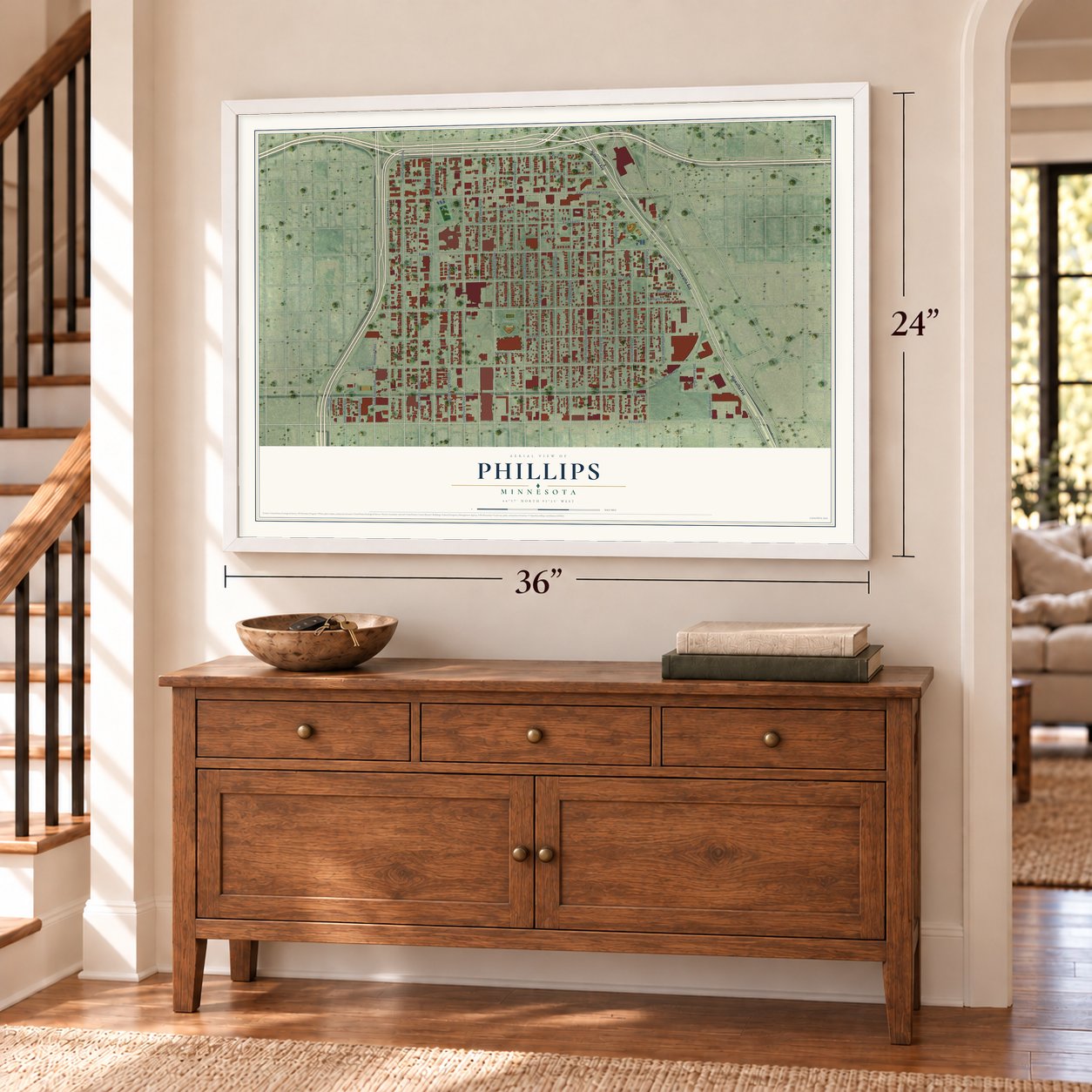 Phillips, Minnesota map, 24 x 36 inch print in a white frame above a dresser by a staircase