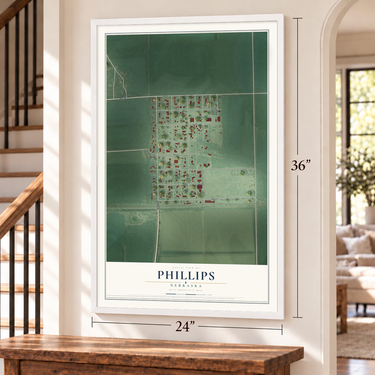 Phillips, Nebraska map, 24 x 36 inch print in a white frame by a staircase