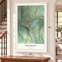 Philmont, New York map, 24 x 36 inch print in a white frame by a staircase