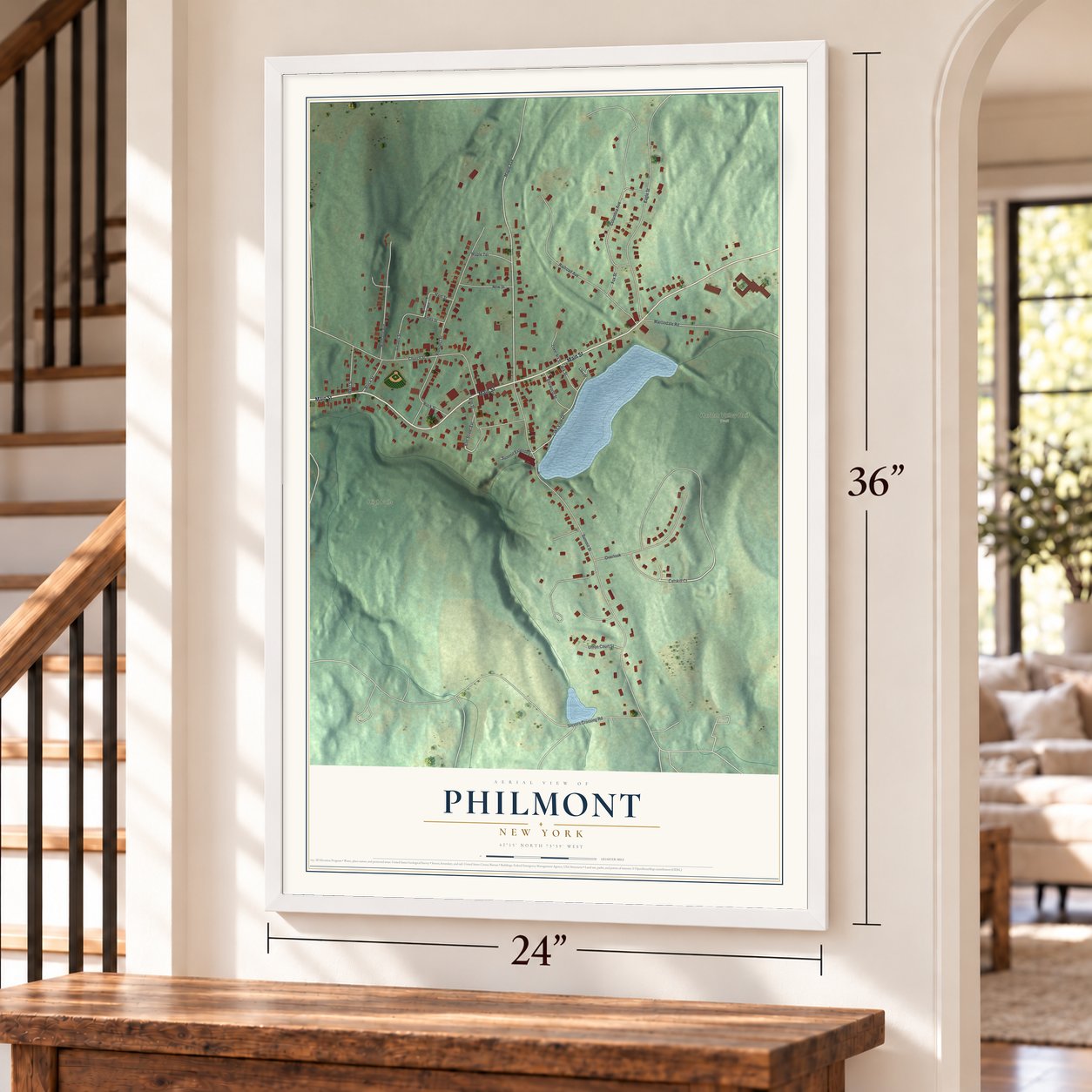 Philmont, New York map, 24 x 36 inch print in a white frame by a staircase