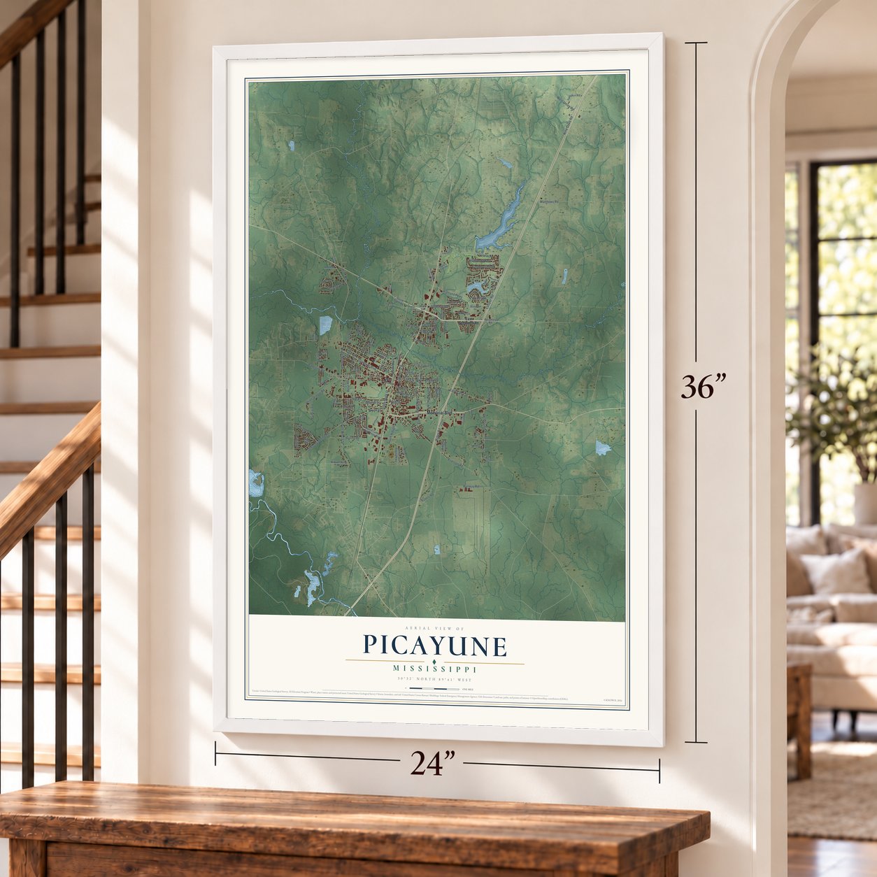 Picayune, Mississippi map, 24 x 36 inch print in a white frame by a staircase