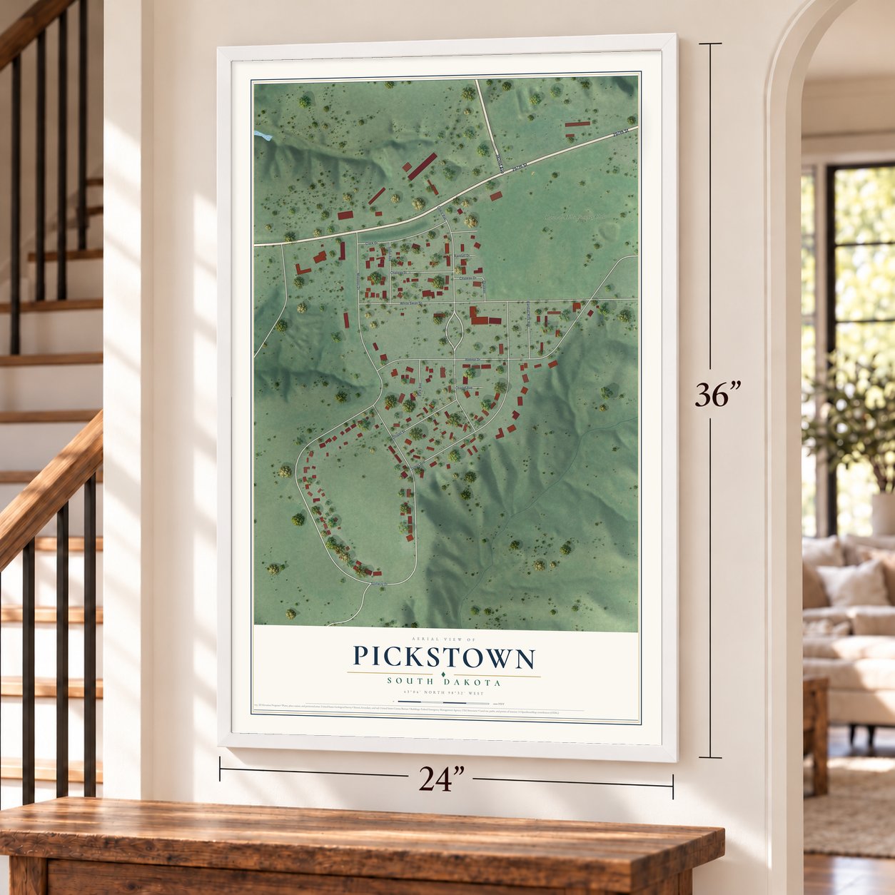 Pickstown, South Dakota map, 24 x 36 inch print in a white frame by a staircase