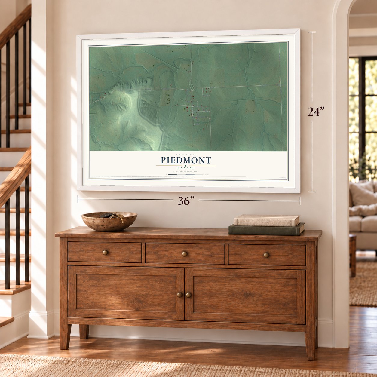 Piedmont, Kansas map, 24 x 36 inch print in a white frame above a dresser by a staircase
