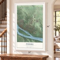 Pierre, South Dakota map, 24 x 36 inch print in a white frame by a staircase
