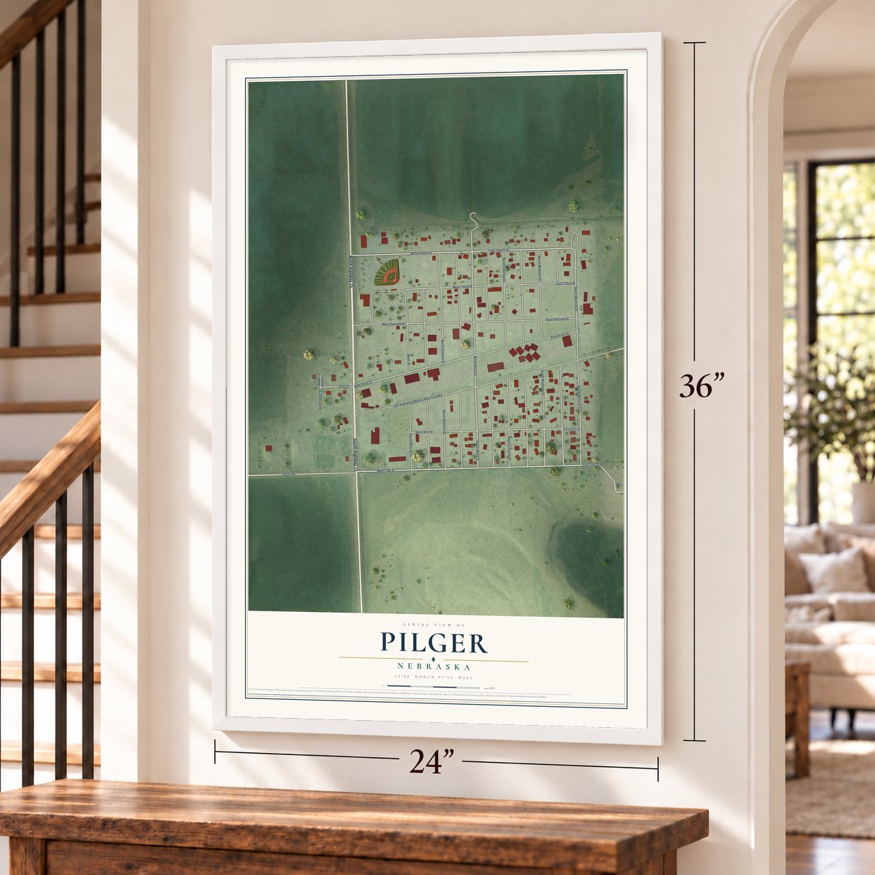 Pilger, Nebraska map, 24 x 36 inch print in a white frame by a staircase