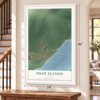 Pilot Station, Alaska map, 24 x 36 inch print in a white frame by a staircase