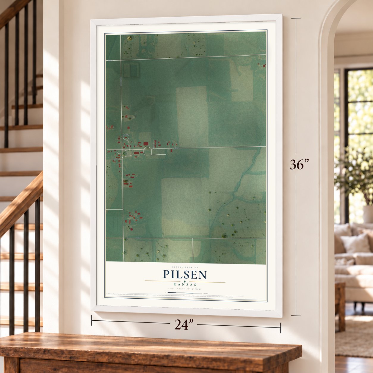 Pilsen, Kansas map, 24 x 36 inch print in a white frame by a staircase