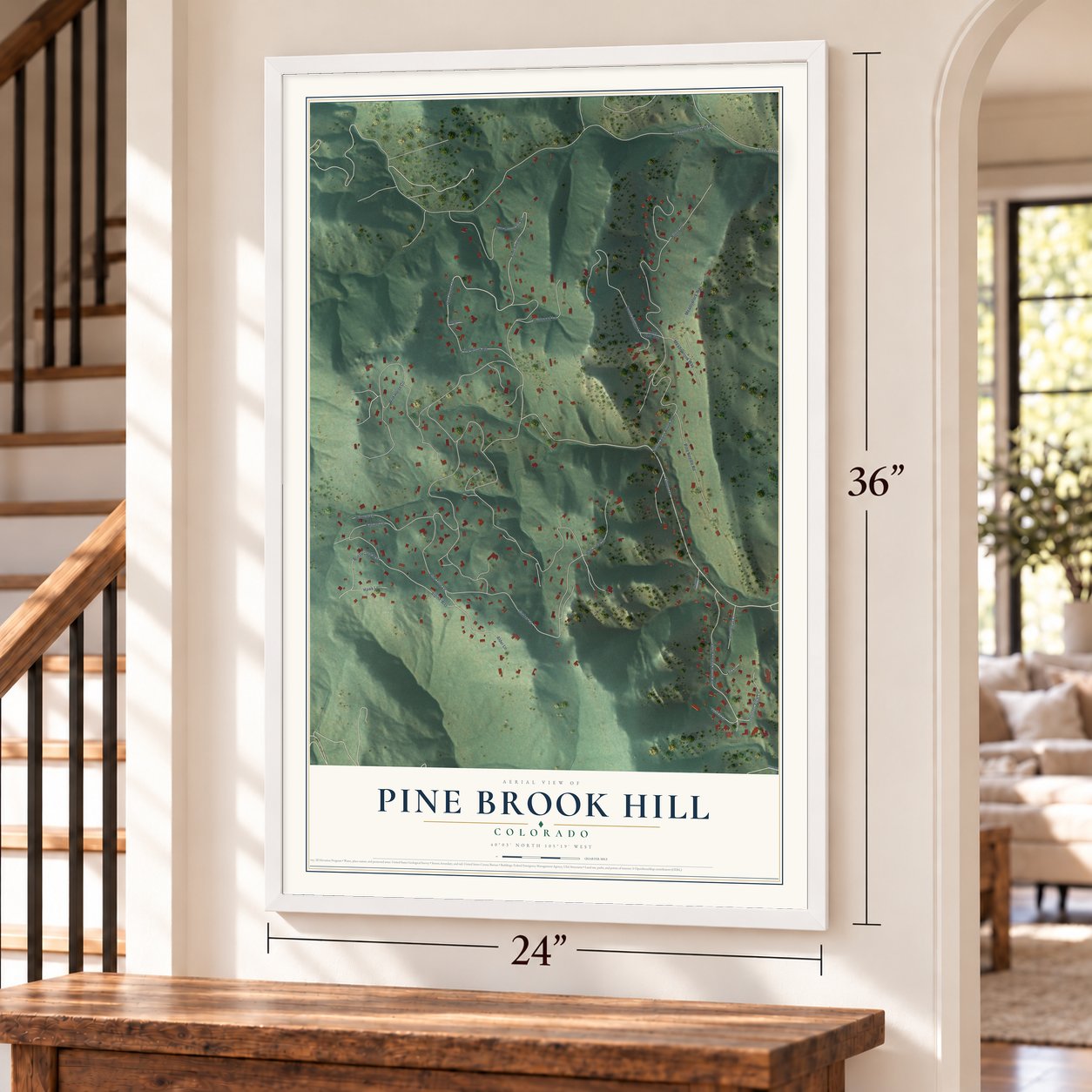 Pine Brook Hill, Colorado map, 24 x 36 inch print in a white frame by a staircase