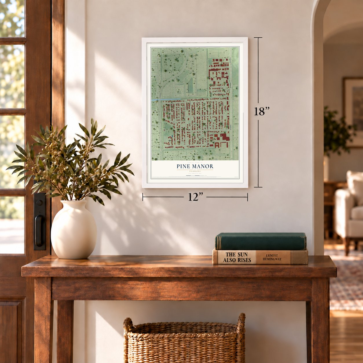 Pine Manor, Florida map, 12 x 18 inch print in a white frame in an entryway