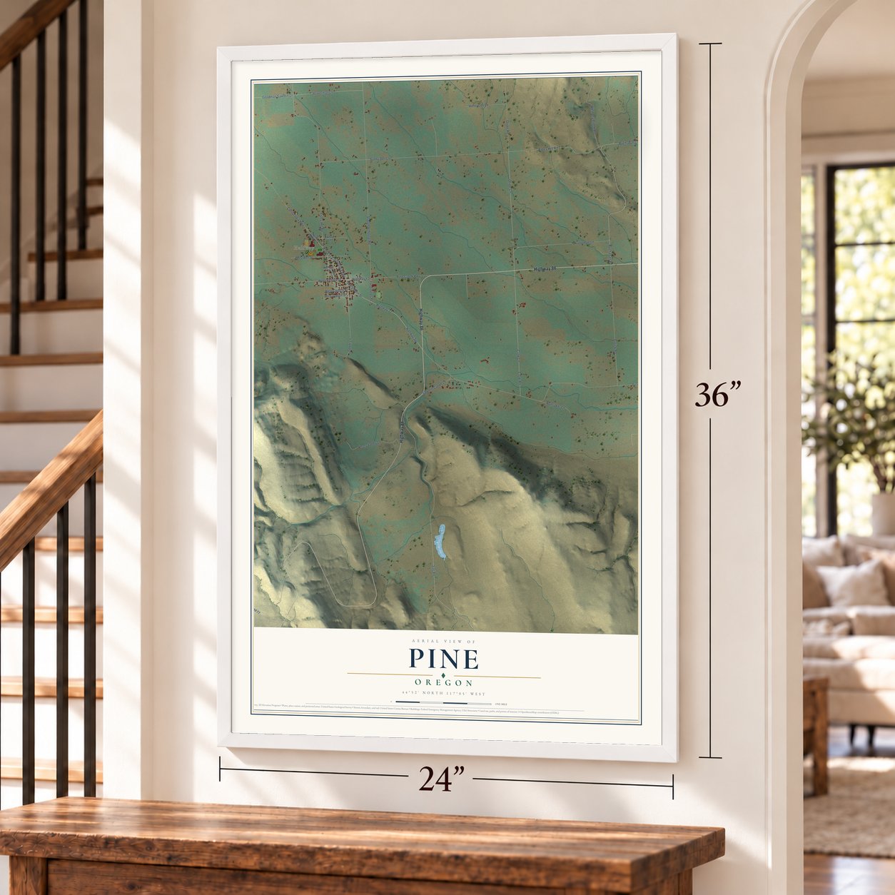 Pine, Oregon map, 24 x 36 inch print in a white frame by a staircase