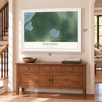 Pine Point, Minnesota map, 24 x 36 inch print in a white frame above a dresser by a staircase