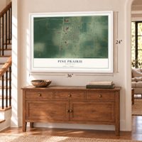 Pine Prairie, Louisiana map, 24 x 36 inch print in a white frame above a dresser by a staircase