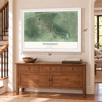 Pinehurst, Texas map, 24 x 36 inch print in a white frame above a dresser by a staircase