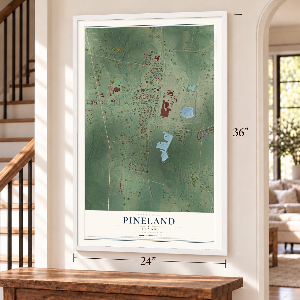 Pineland, Texas map, 24 x 36 inch print in a white frame by a staircase