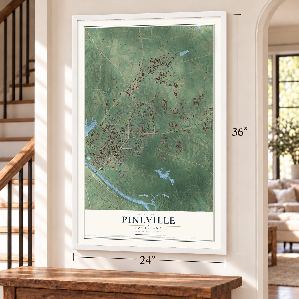 Pineville, Louisiana map, 24 x 36 inch print in a white frame by a staircase