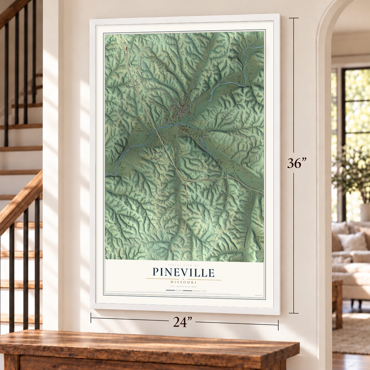 Pineville, Missouri map, 24 x 36 inch print in a white frame by a staircase