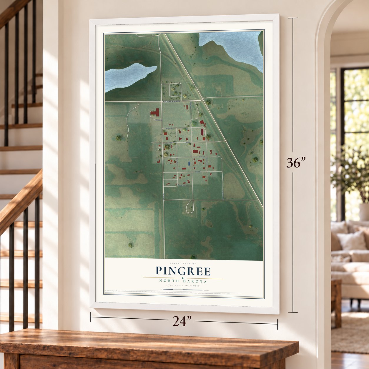 Pingree, North Dakota map, 24 x 36 inch print in a white frame by a staircase