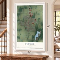 Pioneer, Ohio map, 24 x 36 inch print in a white frame by a staircase