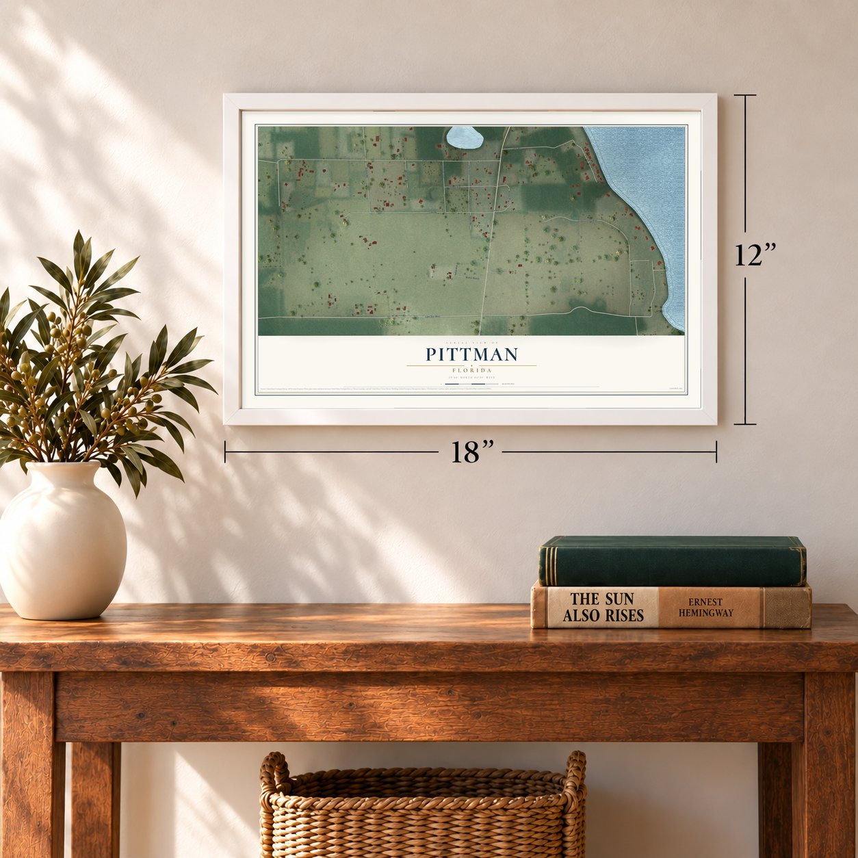 Pittman, Florida map, 12 x 18 inch print in a white frame in an entryway