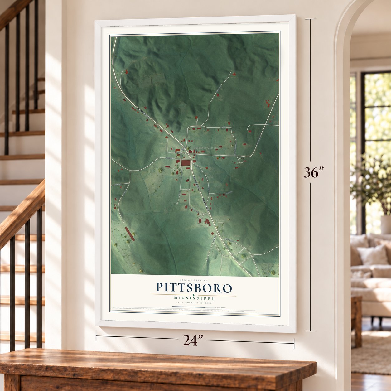 Pittsboro, Mississippi map, 24 x 36 inch print in a white frame by a staircase
