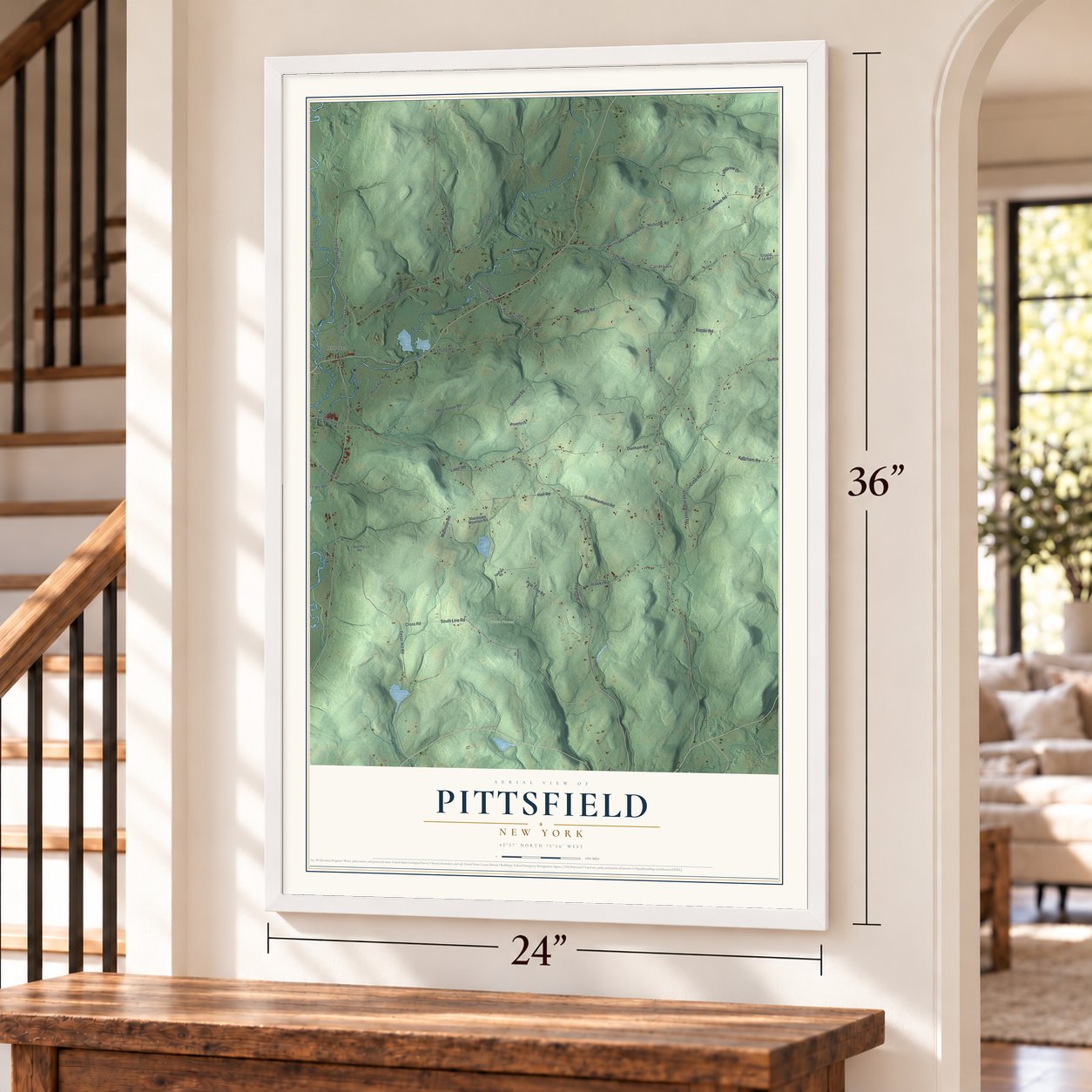 Pittsfield, New York map, 24 x 36 inch print in a white frame by a staircase