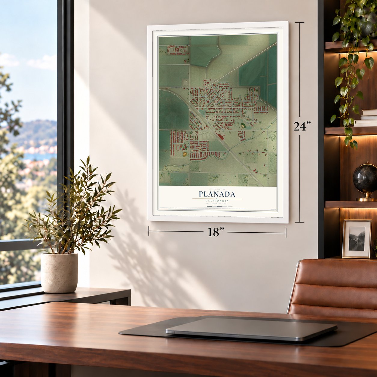 Planada, California map, 18 x 24 inch print in a white frame in a home office