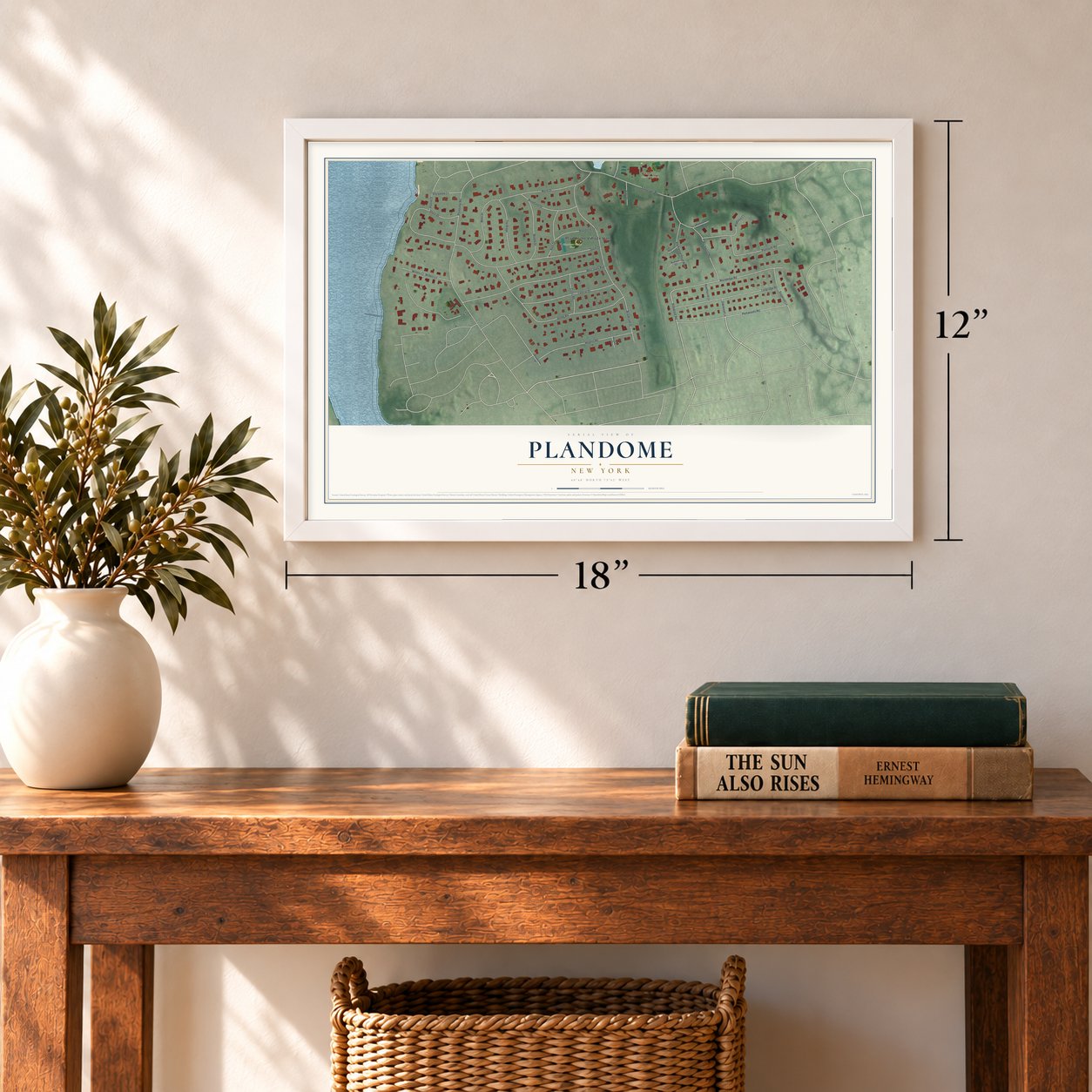 Plandome, New York map, 12 x 18 inch print in a white frame in an entryway