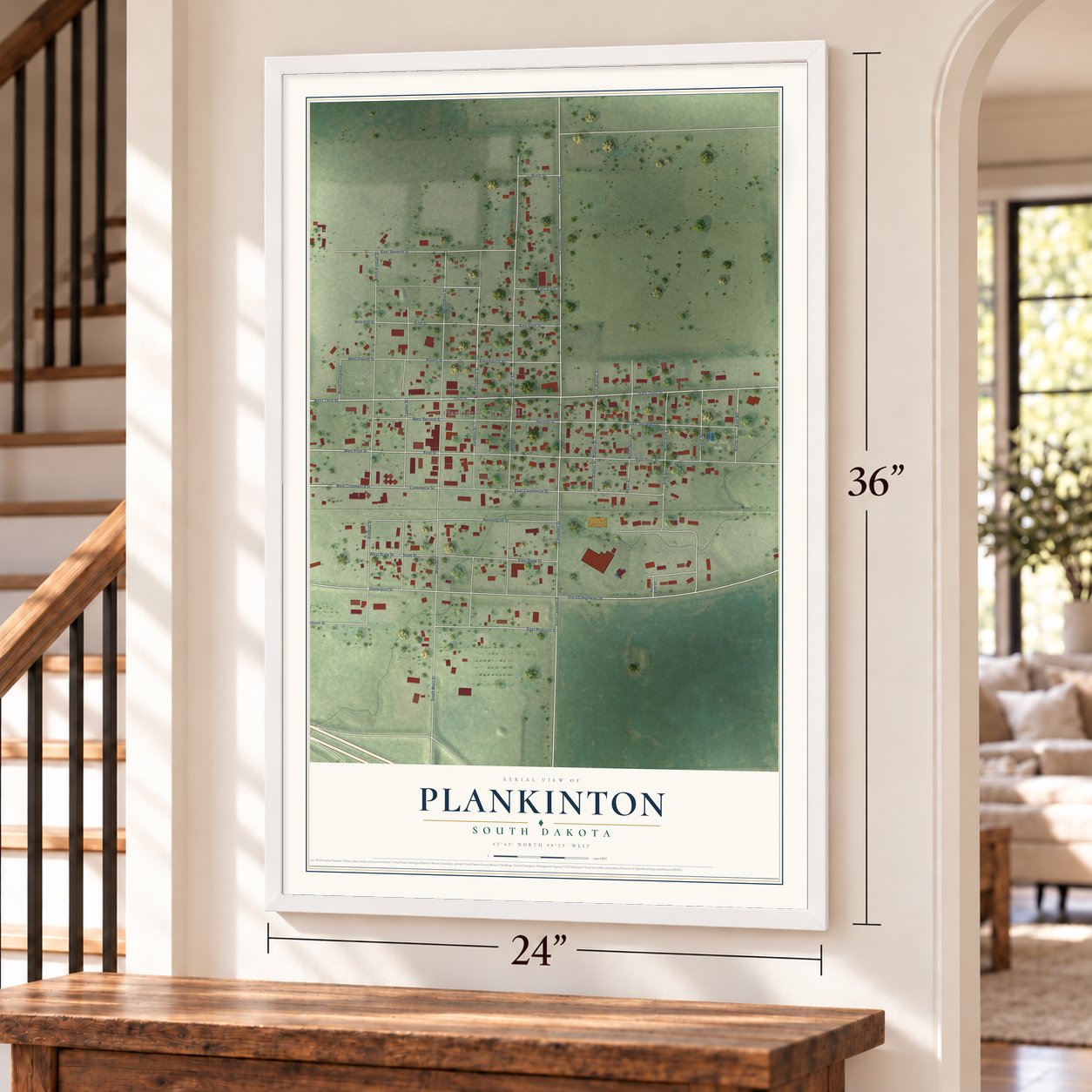 Plankinton, South Dakota map, 24 x 36 inch print in a white frame by a staircase