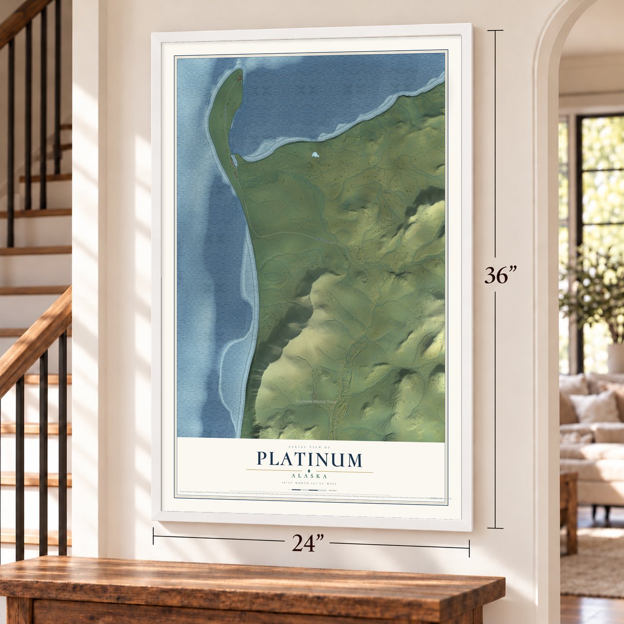 Platinum, Alaska map, 24 x 36 inch print in a white frame by a staircase
