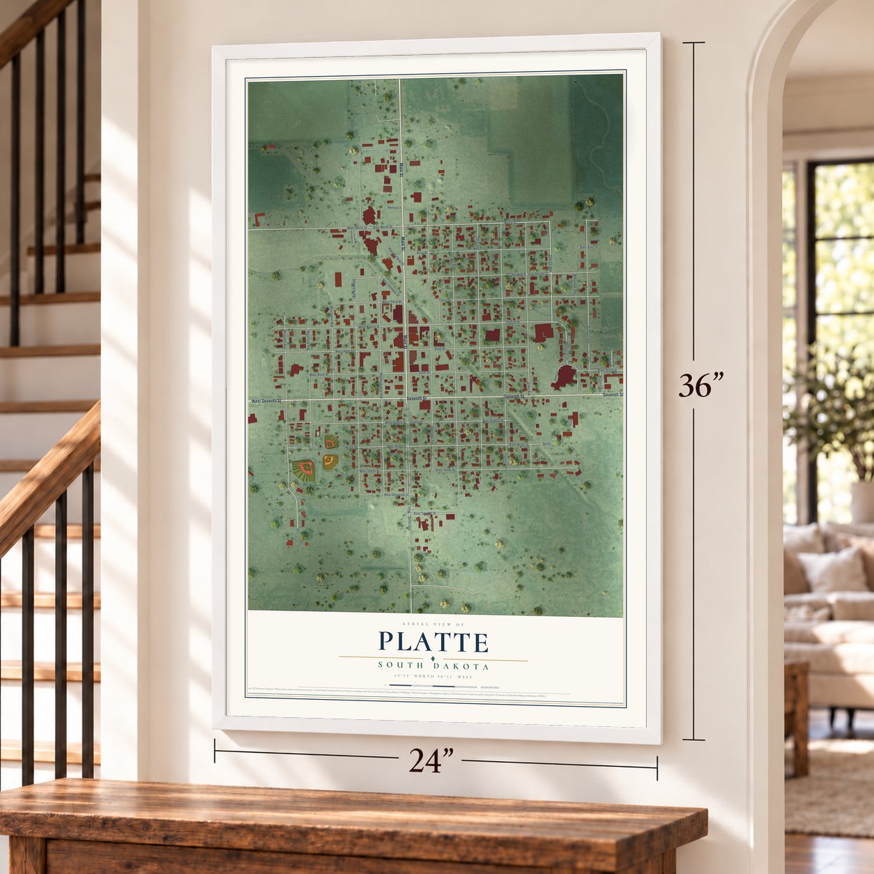 Platte, South Dakota map, 24 x 36 inch print in a white frame by a staircase