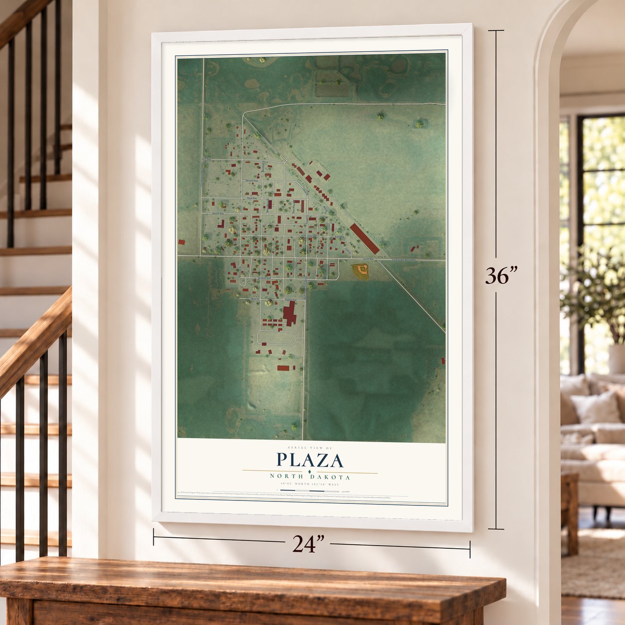 Plaza, North Dakota map, 24 x 36 inch print in a white frame by a staircase