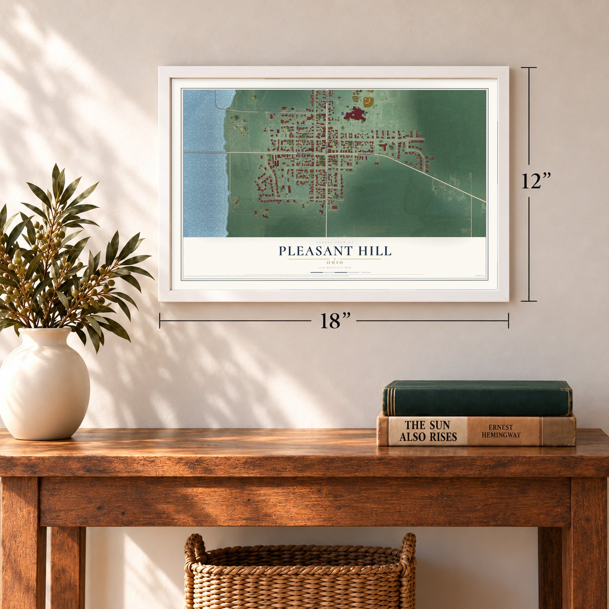 Pleasant Hill, Ohio map, 12 x 18 inch print in a white frame in an entryway