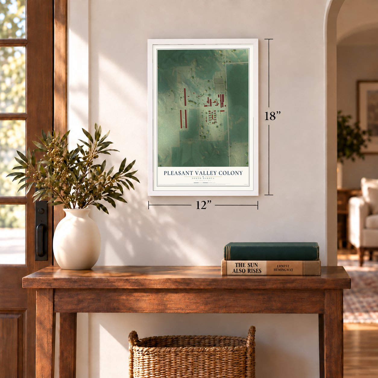 Pleasant Valley Colony, South Dakota map, 12 x 18 inch print in a white frame in an entryway