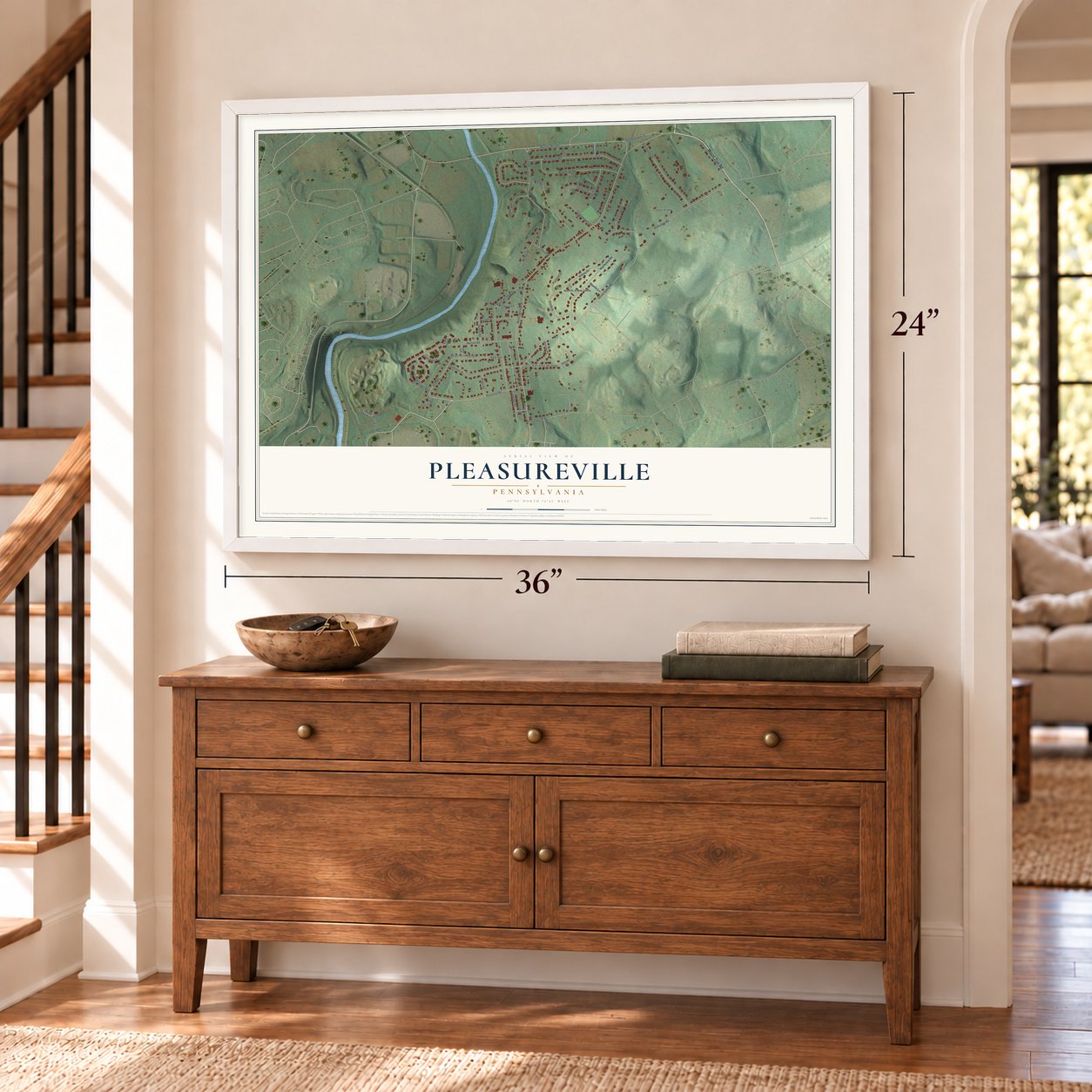 Pleasureville, Pennsylvania map, 24 x 36 inch print in a white frame above a dresser by a staircase