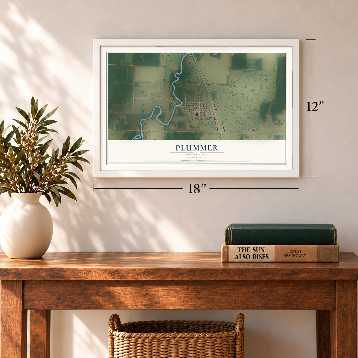 Plummer, Minnesota map, 12 x 18 inch print in a white frame in an entryway