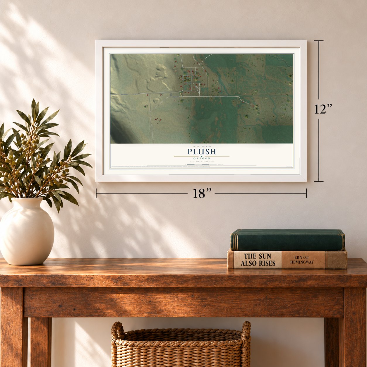 Plush, Oregon map, 12 x 18 inch print in a white frame in an entryway