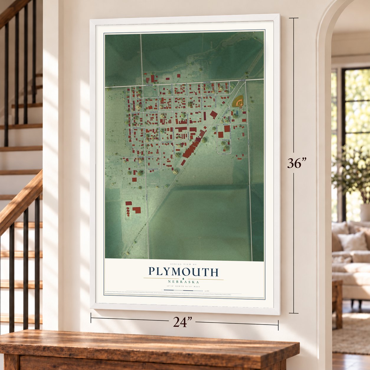 Plymouth, Nebraska map, 24 x 36 inch print in a white frame by a staircase