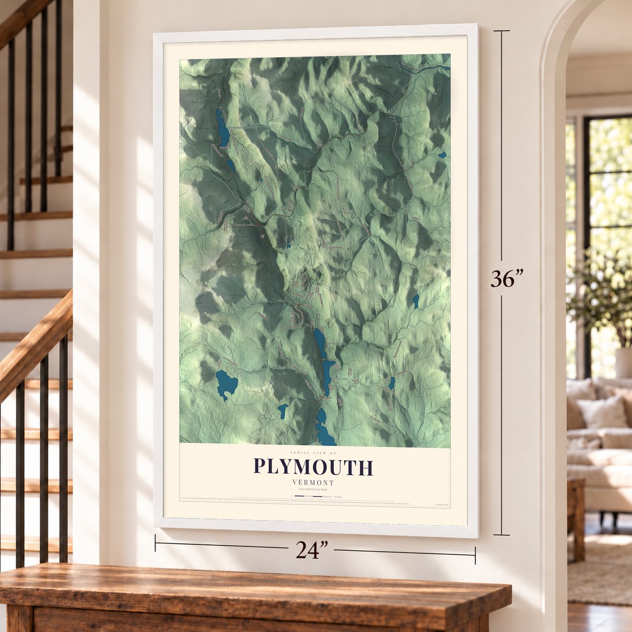 Plymouth, Vermont map, 24 x 36 inch print in a white frame by a staircase