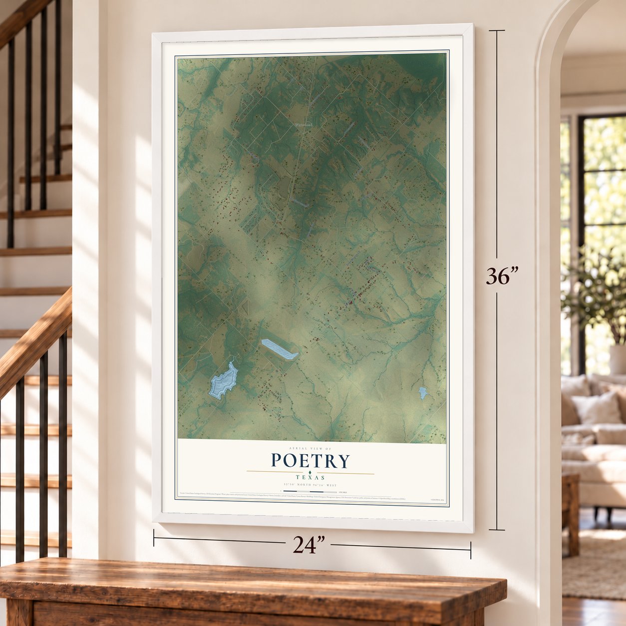 Poetry, Texas map, 24 x 36 inch print in a white frame by a staircase