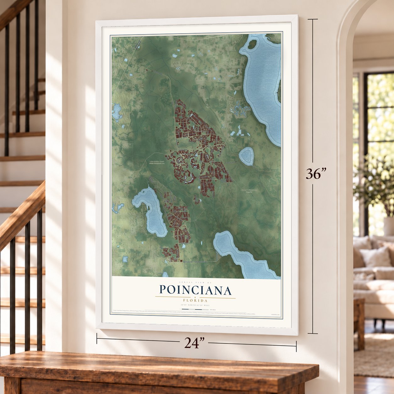 Poinciana, Florida map, 24 x 36 inch print in a white frame by a staircase