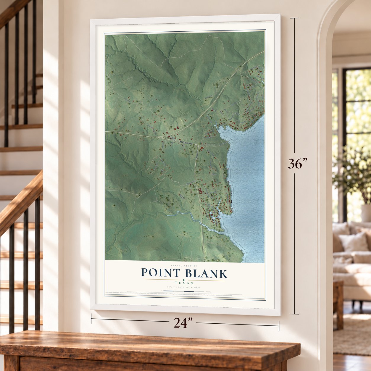 Point Blank, Texas map, 24 x 36 inch print in a white frame by a staircase