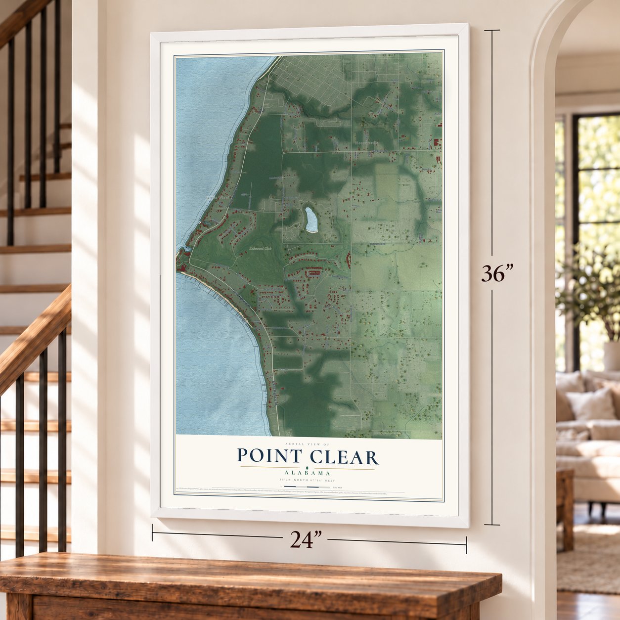 Point Clear, Alabama map, 24 x 36 inch print in a white frame by a staircase