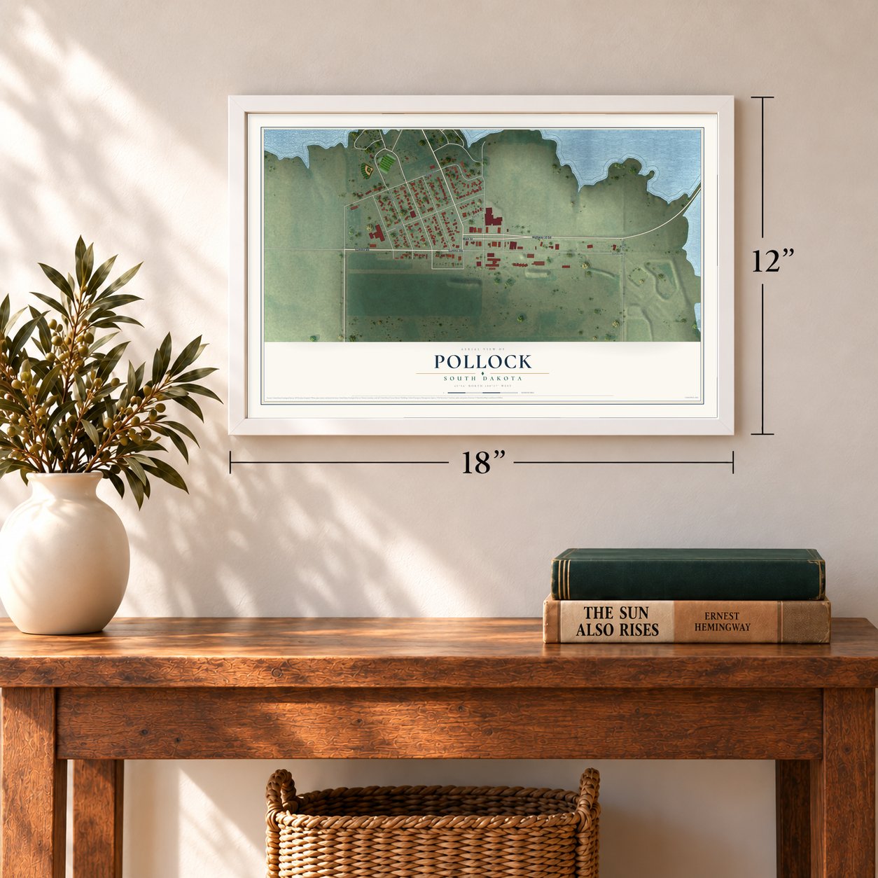 Pollock, South Dakota map, 12 x 18 inch print in a white frame in an entryway