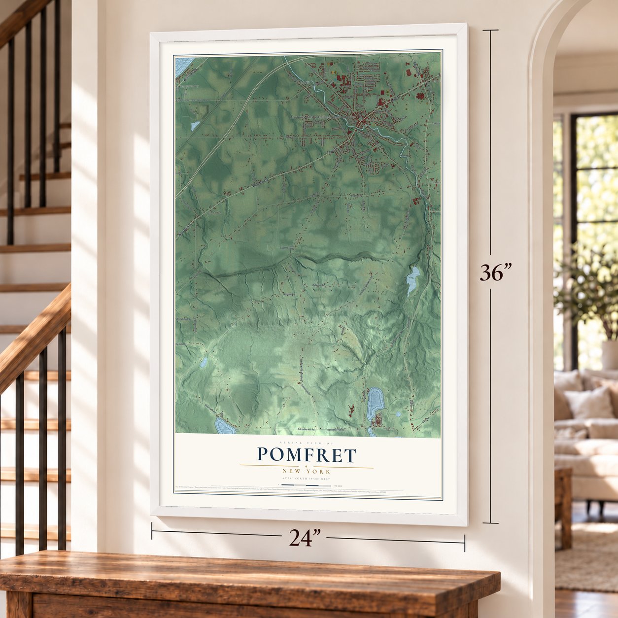 Pomfret, New York map, 24 x 36 inch print in a white frame by a staircase
