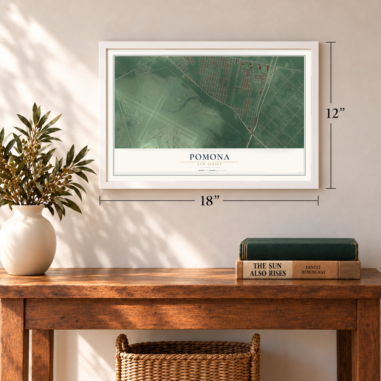 Pomona, New Jersey map, 12 x 18 inch print in a white frame in an entryway